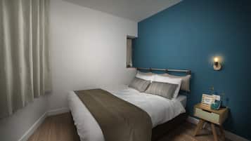 Un dormitorio con cama, mesita de noche, lámpara de pared y ventana con cortinas.