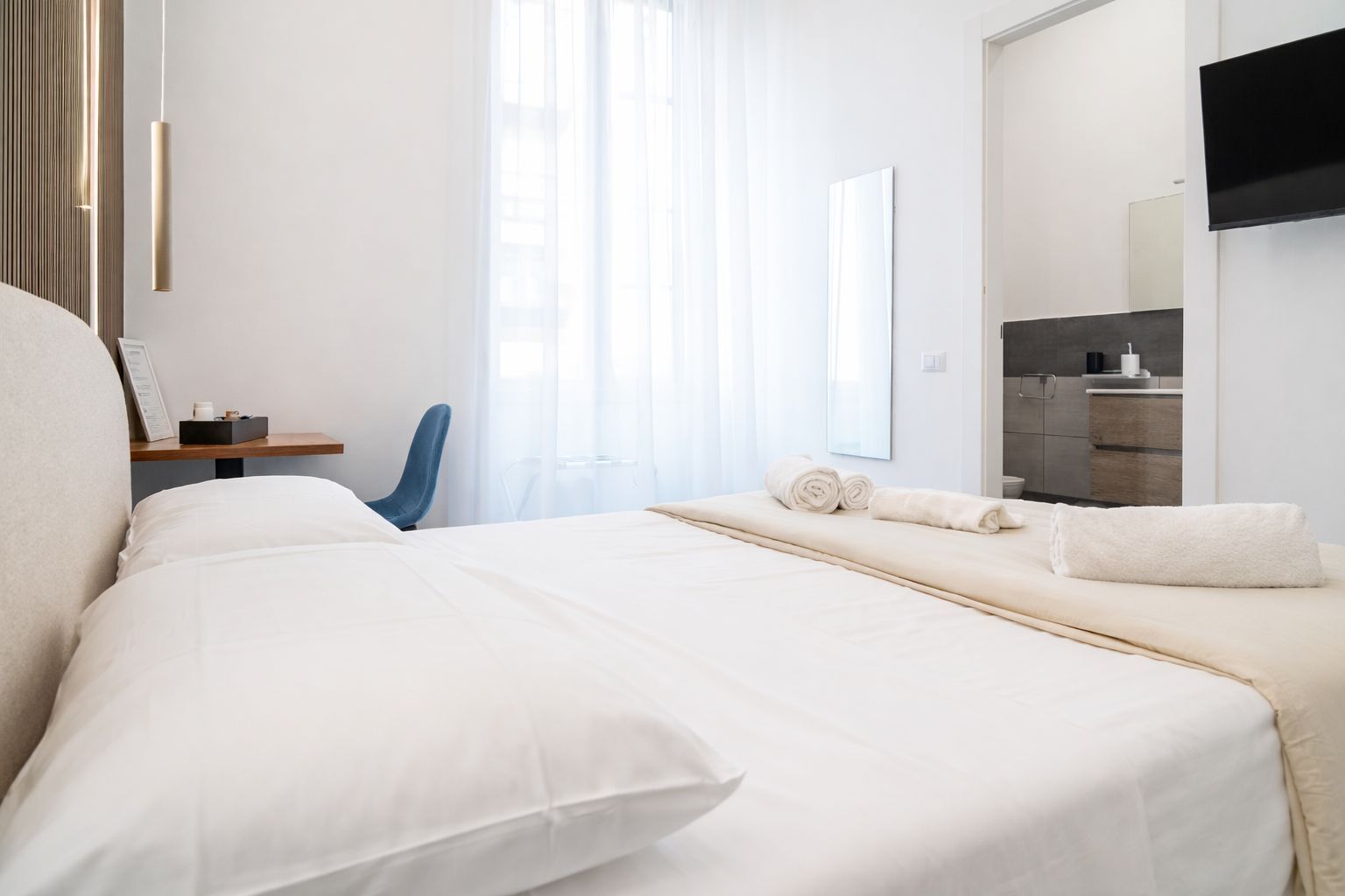 Frette Italian sheets, premium bedding, down comforters