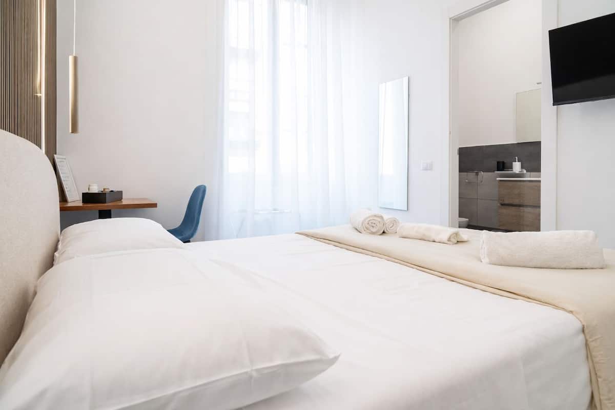 Frette Italian sheets, premium bedding, down comforters