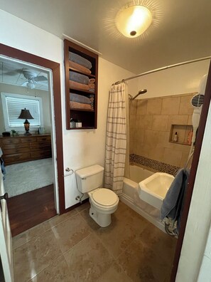 Combined shower/bathtub, hair dryer, towels, soap - SweetChick Farmhouse, slight country feel with close city convenience. (Bryan)
