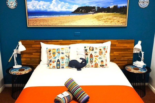 Queen Room | Premium bedding, memory foam beds, laptop workspace, blackout drapes