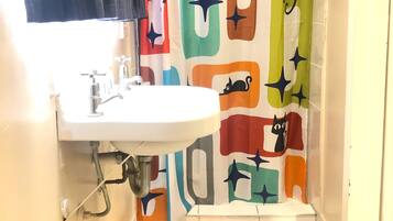 Shower, eco-friendly toiletries, hair dryer, towels