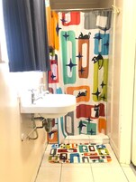 Shower, eco-friendly toiletries, hair dryer, towels
