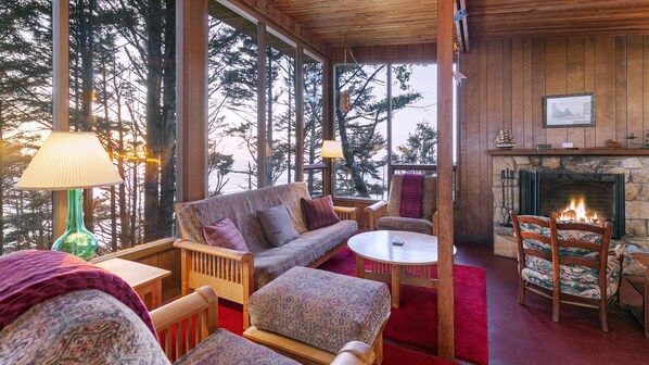 Fireplace, books, music library, stereo - Oceanfront Beach House in Falcon Cove, Arch Cape, Oregon.  Near Cannon Manzanita (Arch Cape)