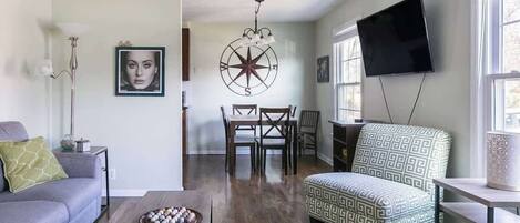 Flat-screen TV, books, offices