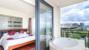 Family Suite, Sea View | Minibar, in-room safe, desk, blackout drapes