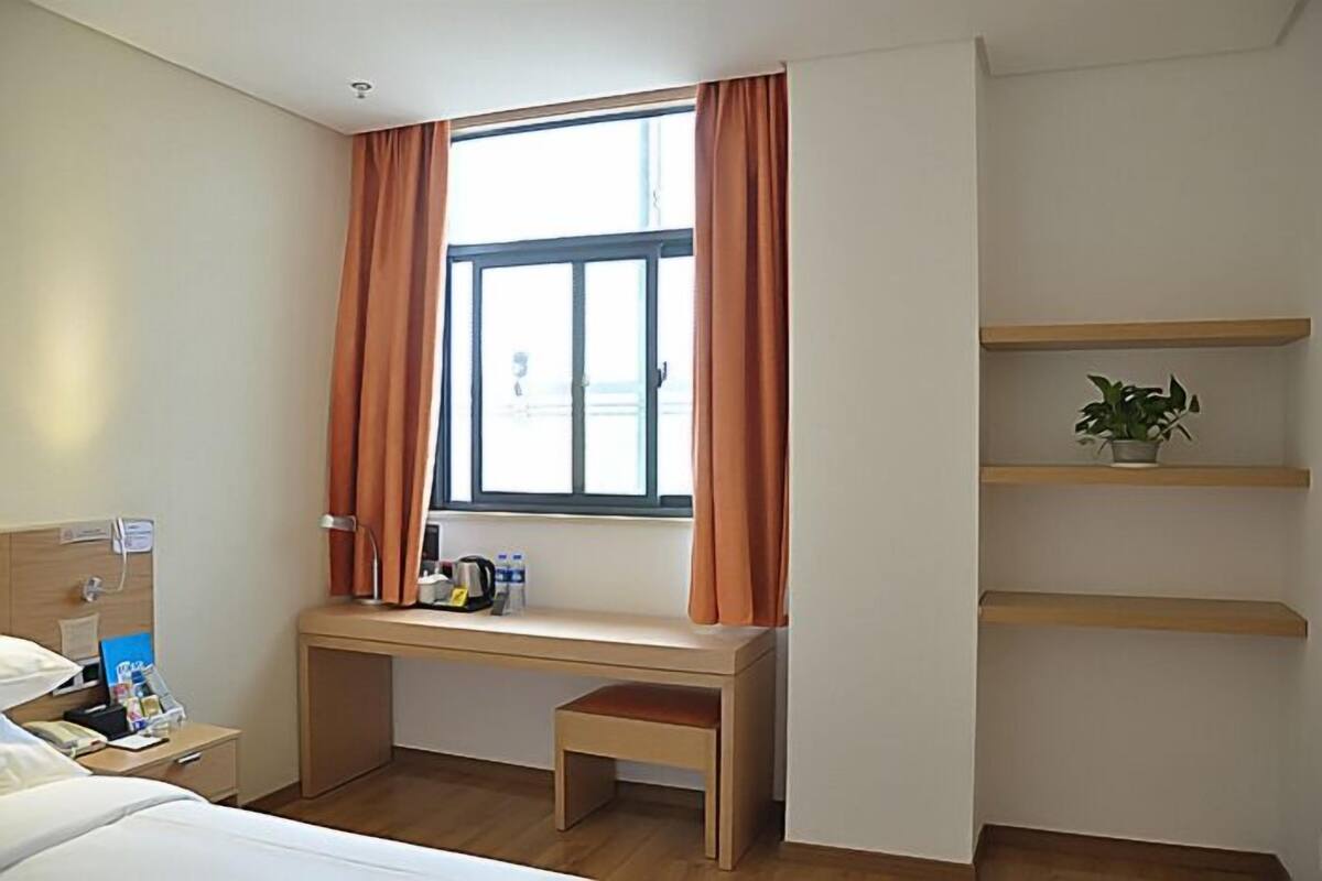 Desk, blackout curtains, iron/ironing board, rollaway beds