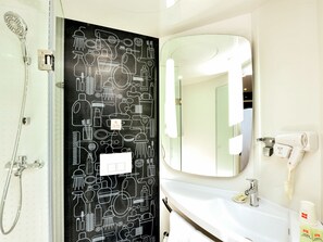 Shower, free toiletries, hair dryer, slippers