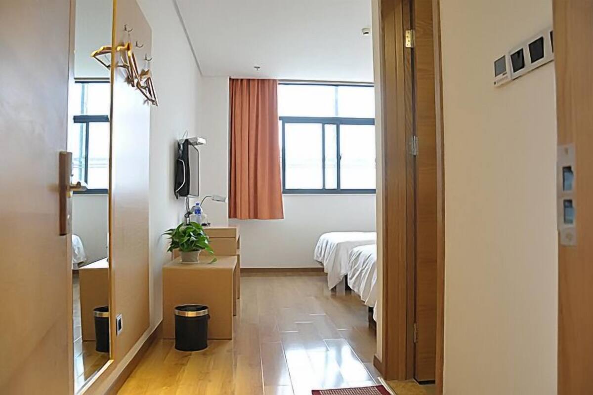 Desk, blackout curtains, iron/ironing board, rollaway beds