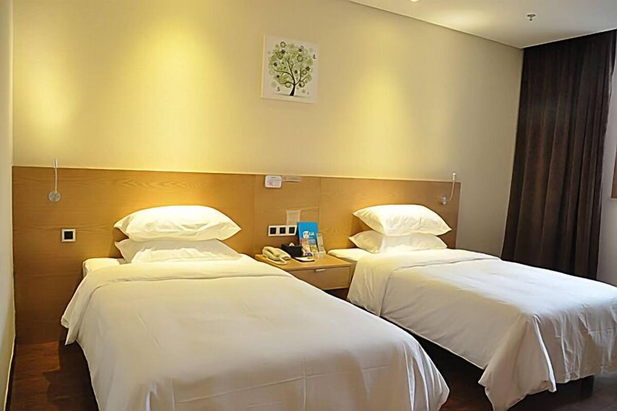 Desk, blackout curtains, iron/ironing board, rollaway beds