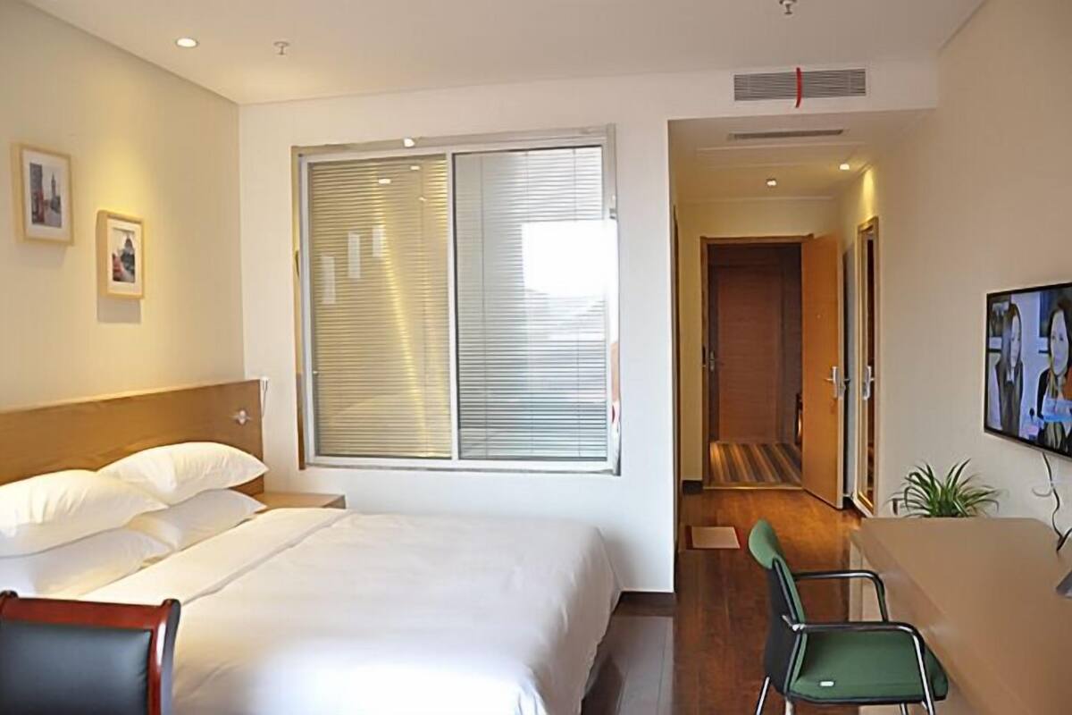 Desk, blackout curtains, iron/ironing board, rollaway beds