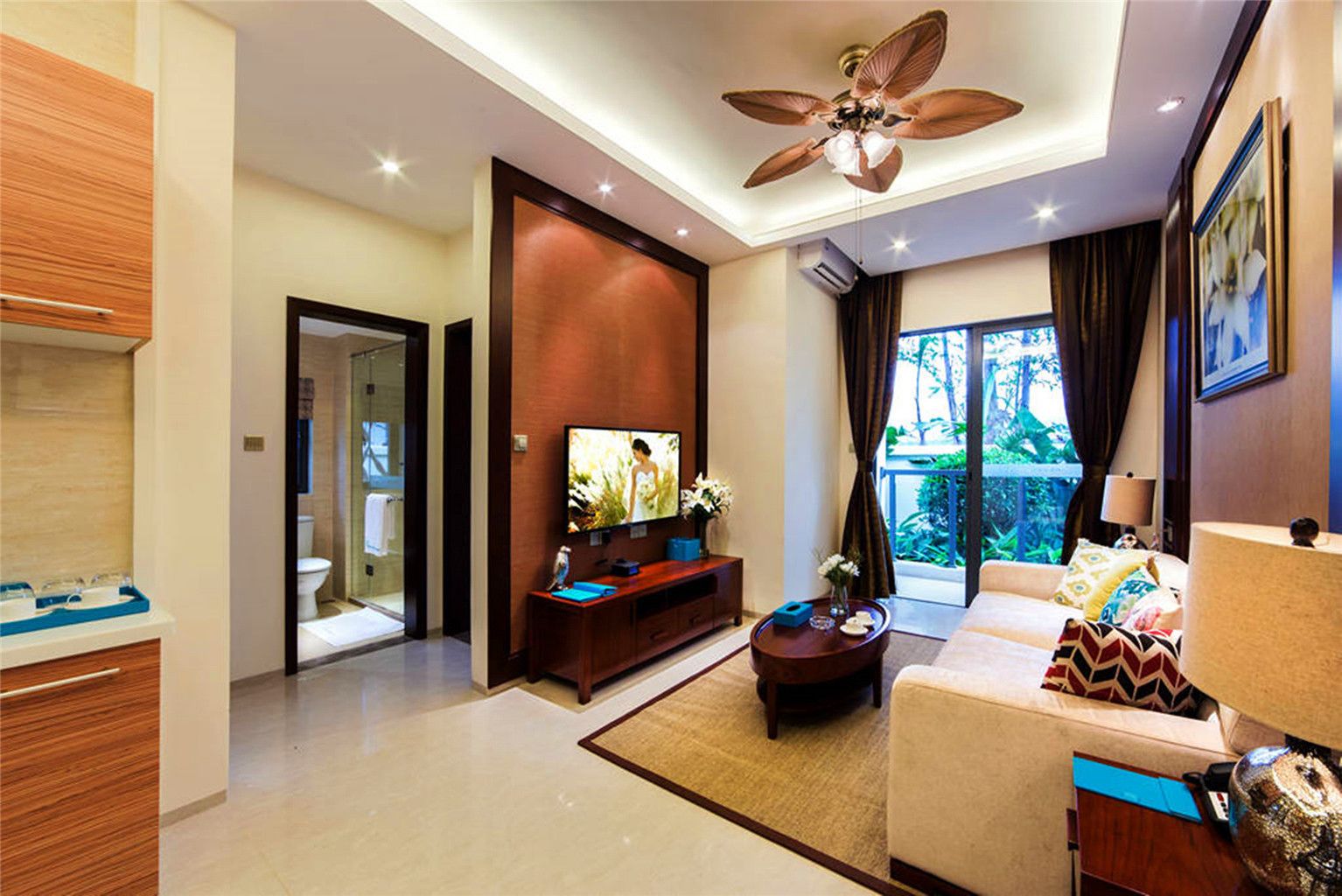 family suite, 2 bedrooms, mountain view | living area | lcd tv
