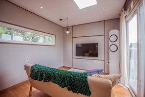 49-inch flat-screen TV with cable channels, TV