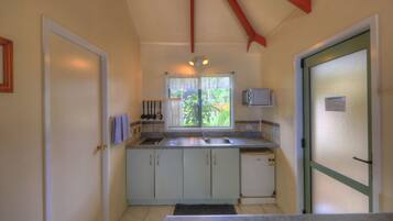 Comfort Bungalow, 1 Queen Bed, Beach View | Private kitchenette | Fridge, microwave, stovetop, coffee/tea maker