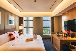 Premium bedding, down duvets, minibar, in-room safe