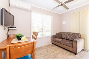 Studio | Living area | Flat-screen TV, DVD player - Holiday Haven Lake Tabourie (Lake Tabourie)