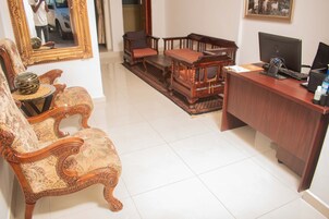 Exclusive Double Room | Living area | Flat-screen TV, fireplace