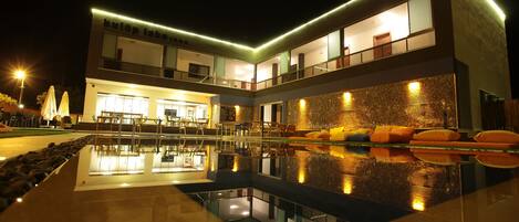 Seasonal outdoor pool, pool umbrellas, pool loungers