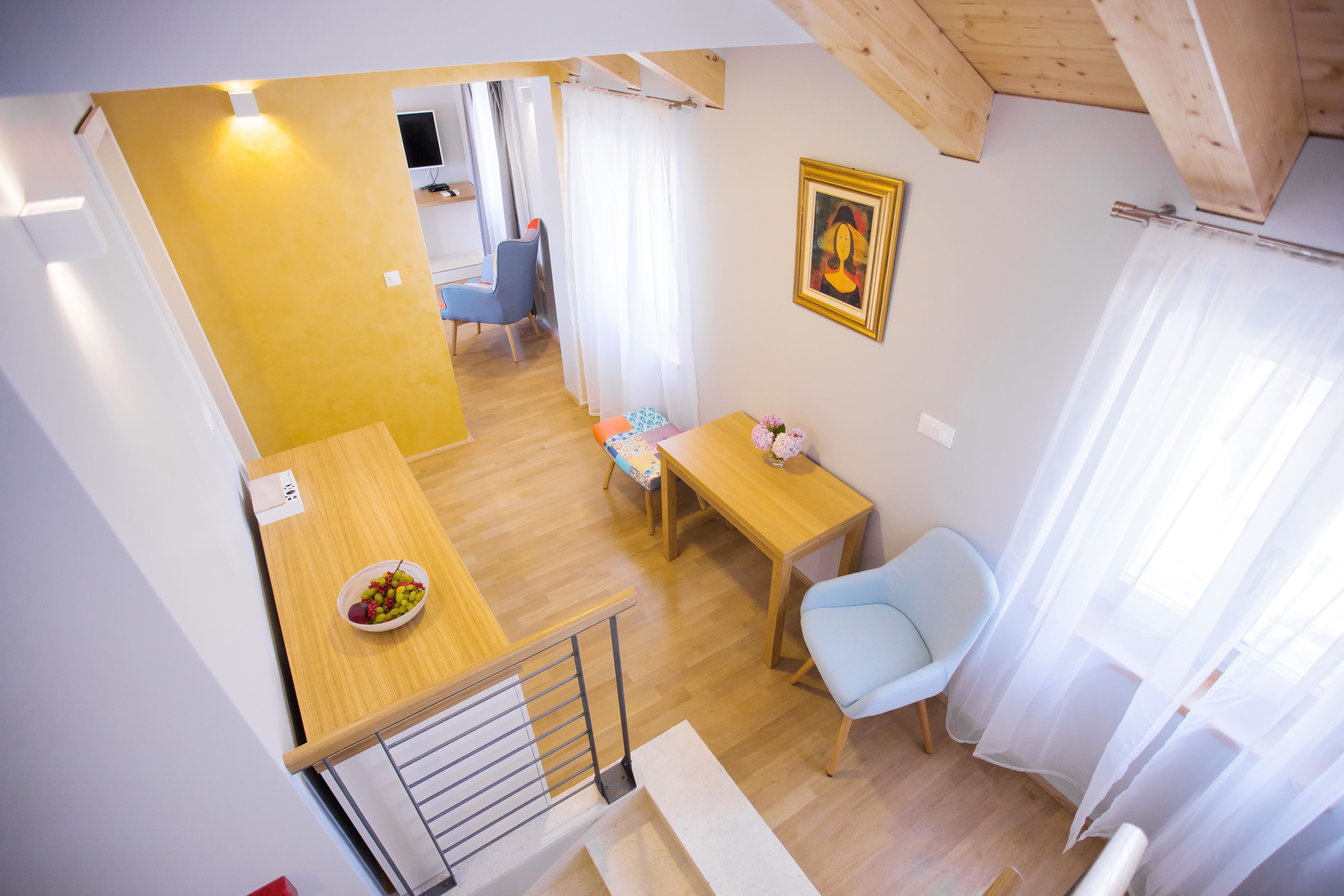 superior top floor suite | living area | flat-screen tv