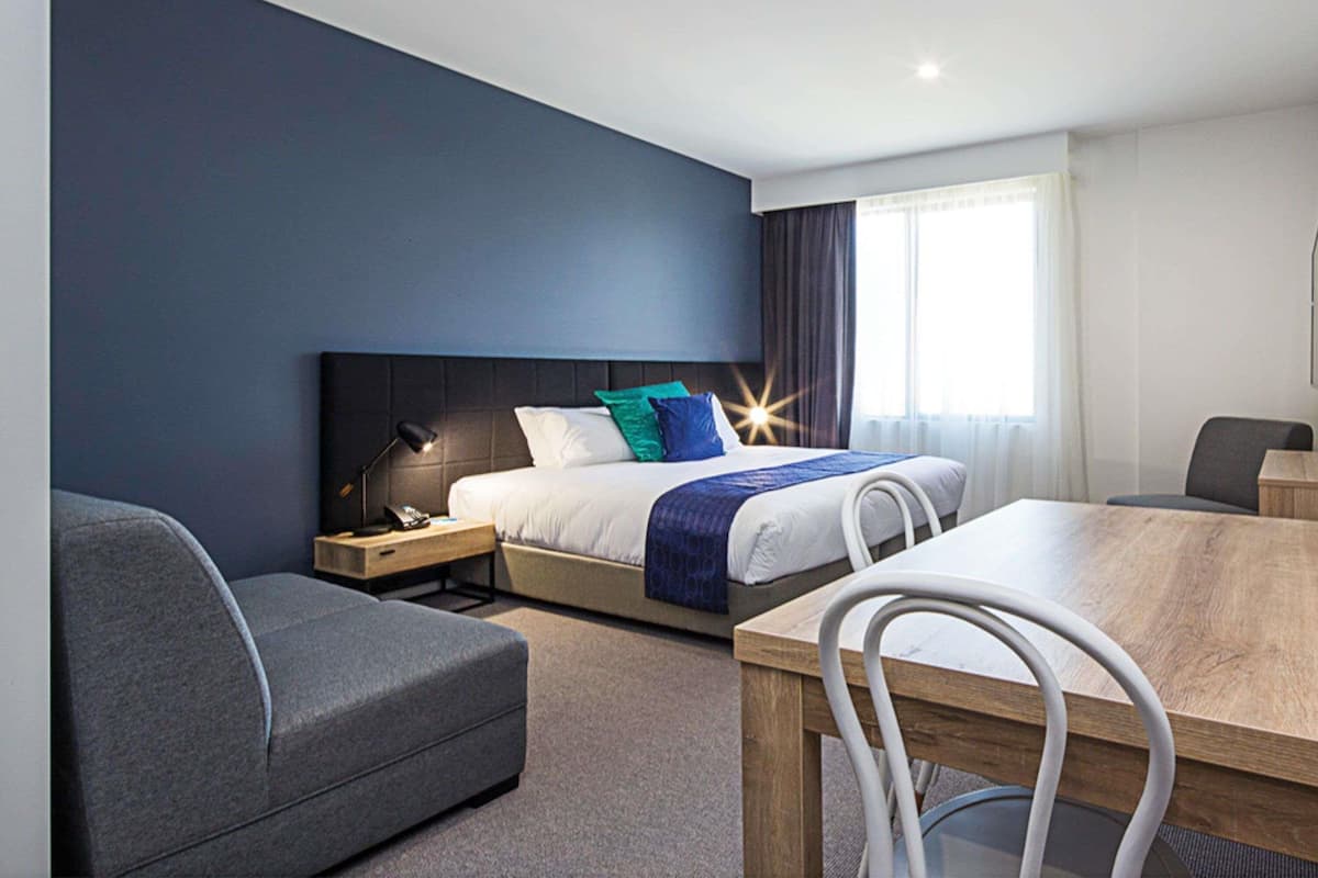 Suite, 2 Bedrooms | In-room safe, desk, blackout curtains, iron/ironing board