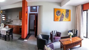 Apartemen Superior, 2 kamar tidur | Area keluarga | TV layar datar