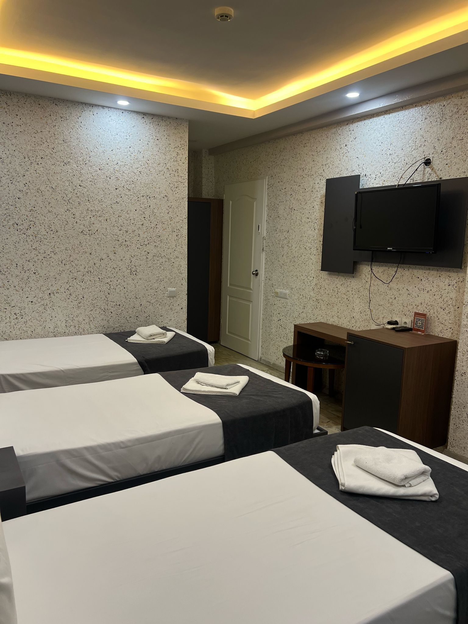 basic triple room | minibar, desk, laptop workspace, iron/ironing board