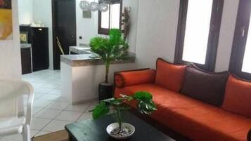 Standard Apartment, 1 Bedroom (T3) | Living room | Flat-screen TV