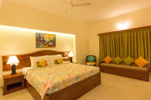 Deluxe Room, 1 King Bed | Living room | Flat-screen TV - Viva Hotel (Margao)