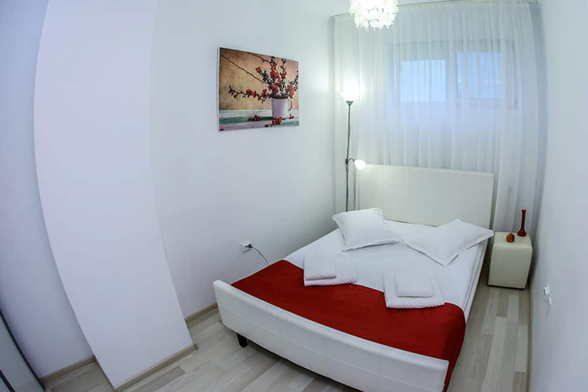 Deluxe Apartment, 1 Bedroom, Terrace | 1 bedroom, desk, soundproofing, iron/ironing board (on request)