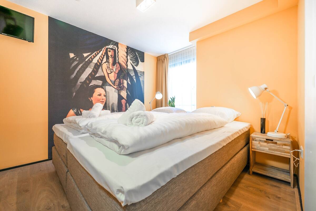 Premium bedding, memory-foam beds, blackout curtains, iron/ironing board