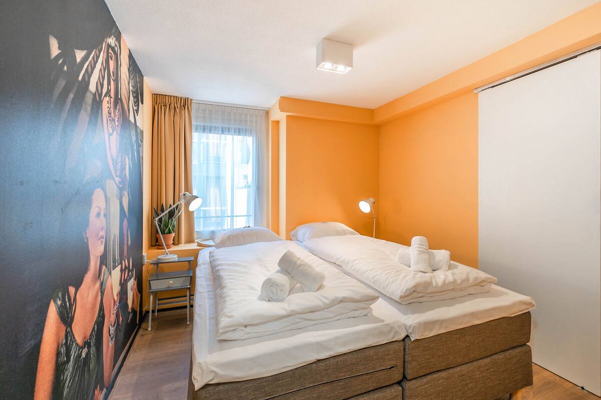 Premium bedding, memory-foam beds, blackout curtains, iron/ironing board