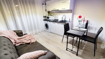 Deluxe Apartment, 1 Bedroom, Terrace | Private kitchen | Fridge, microwave, stovetop, coffee/tea maker