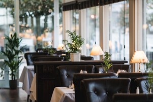 Breakfast, lunch, dinner served; local cuisine 