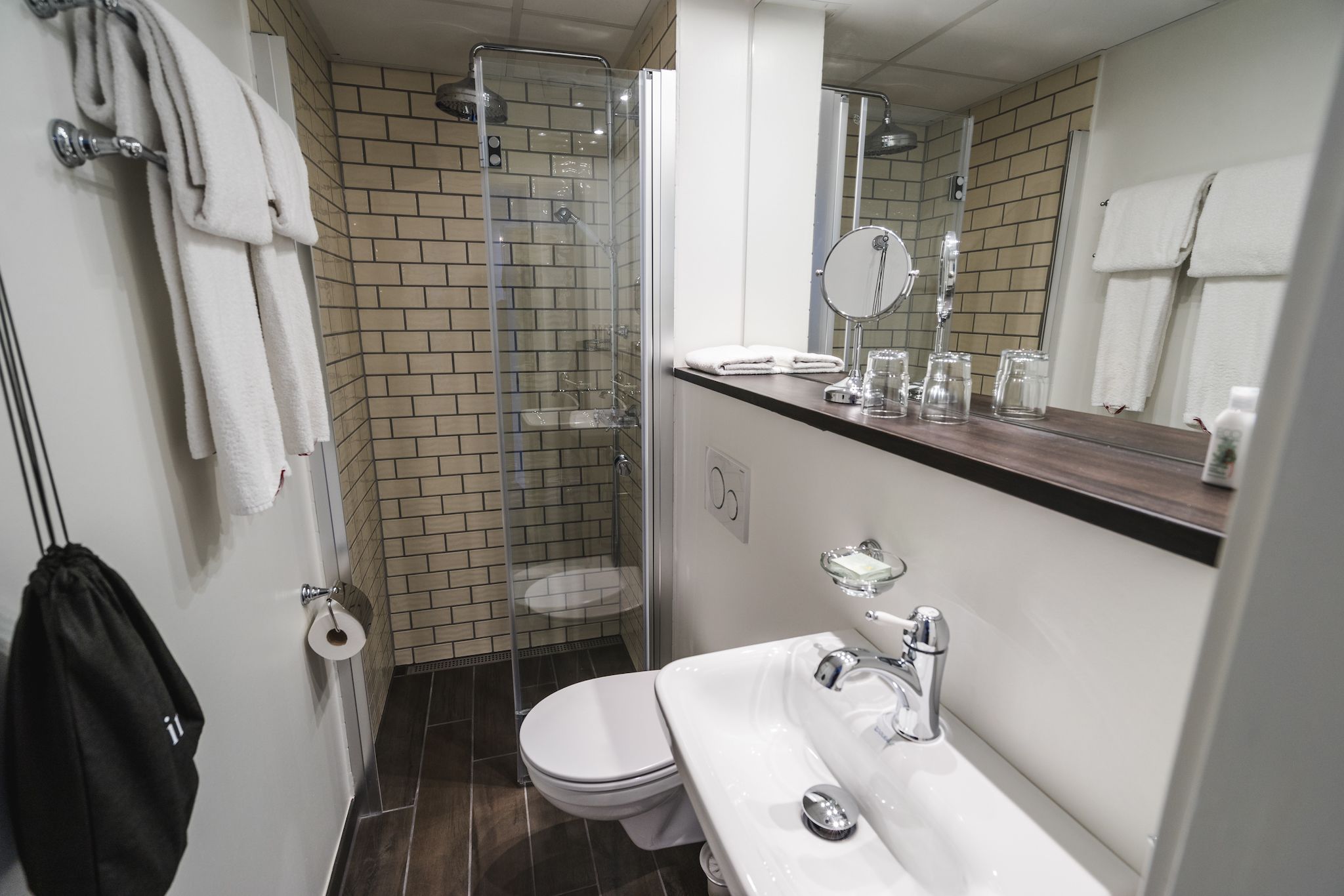 shower, free toiletries, hair dryer, towels