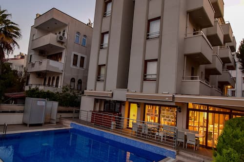 Outdoor pool, pool umbrellas, pool loungers