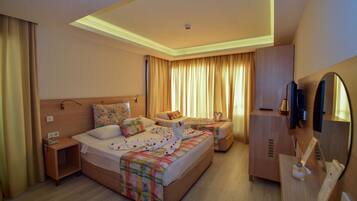 Triple Suite, Terrace | Minibar, in-room safe, desk, iron/ironing board