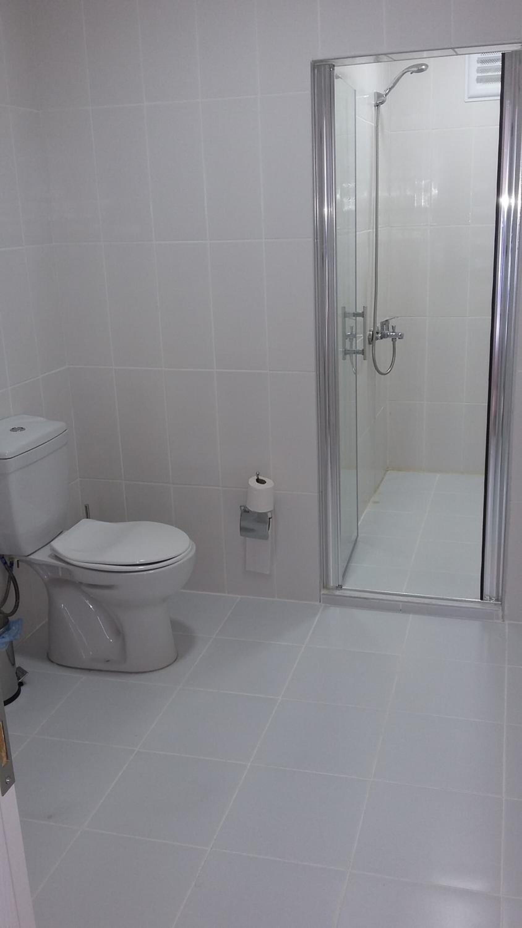 shower, free toiletries, hair dryer, slippers