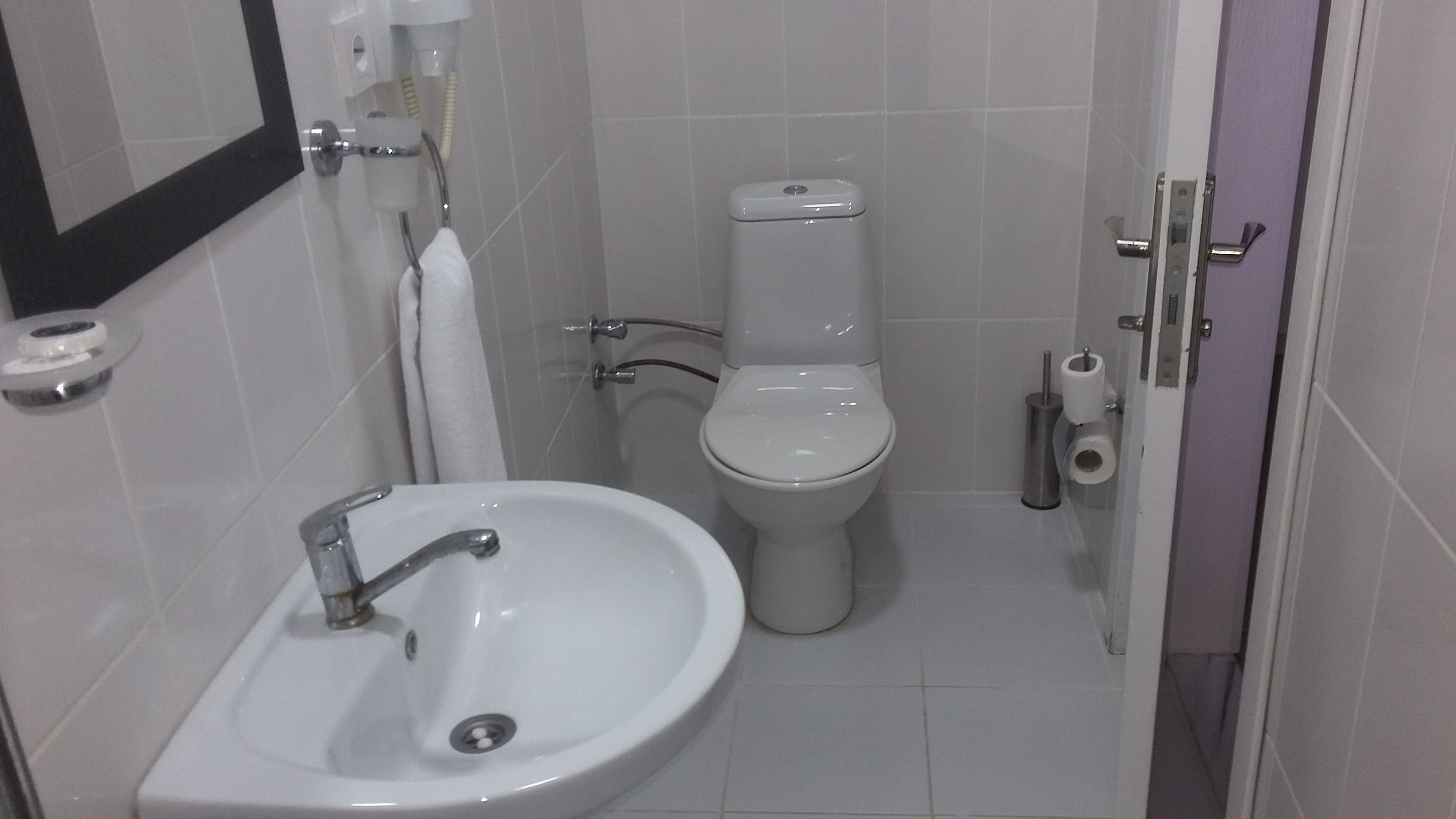 shower, free toiletries, hair dryer, slippers