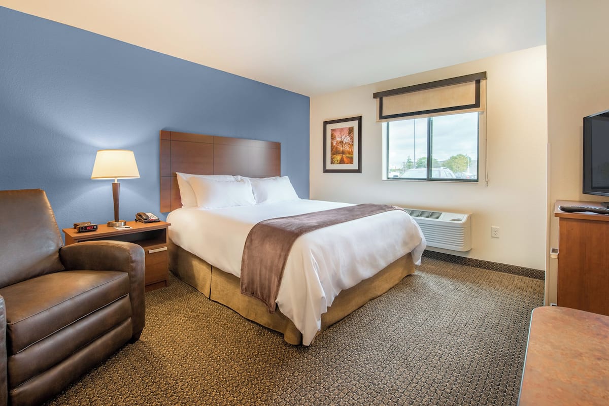 Premium bedding, pillow-top beds, desk, laptop workspace