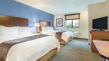 Premium bedding, pillowtop beds, desk, laptop workspace