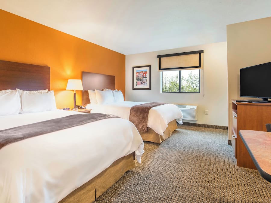 Roupas de cama premium, camas com colchões pillow-top, escrivaninha