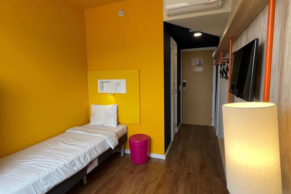 Apartamento, 2 camas de solteiro | Cortinas blackout, Wi-Fi de cortesia, roupa de cama