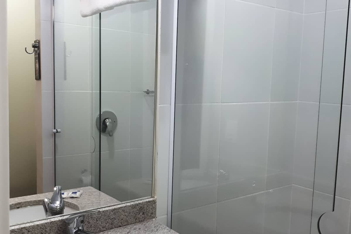 apartment, 2 single beds | bathroom | shower, eco-friendly toiletries, towels