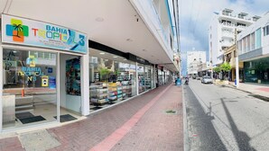 A storefront with a sign reading "BAHIA TROPICAL 3" and a visible entrance. - Bahia Tropical III (San Andrés)