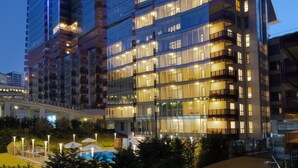 A modern hotel with a prominent 'Somerset' sign, multiple floors, and a well-lit facade. - Somerset Maslak Istanbul (Sariyer)