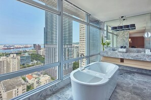 Separate tub and shower, deep soaking tub, hair dryer, bathrobes