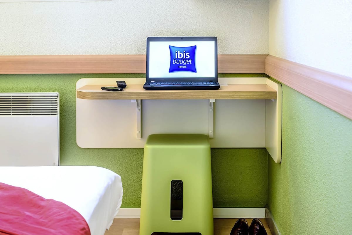 Desk, soundproofing, iron/ironing board, free cribs/infant beds