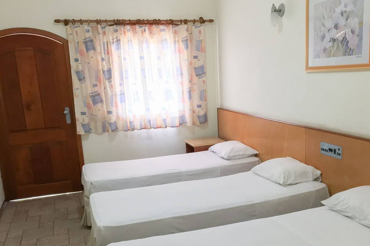 Standard Room, 3 Twin Beds | WiFi (free), bed sheets