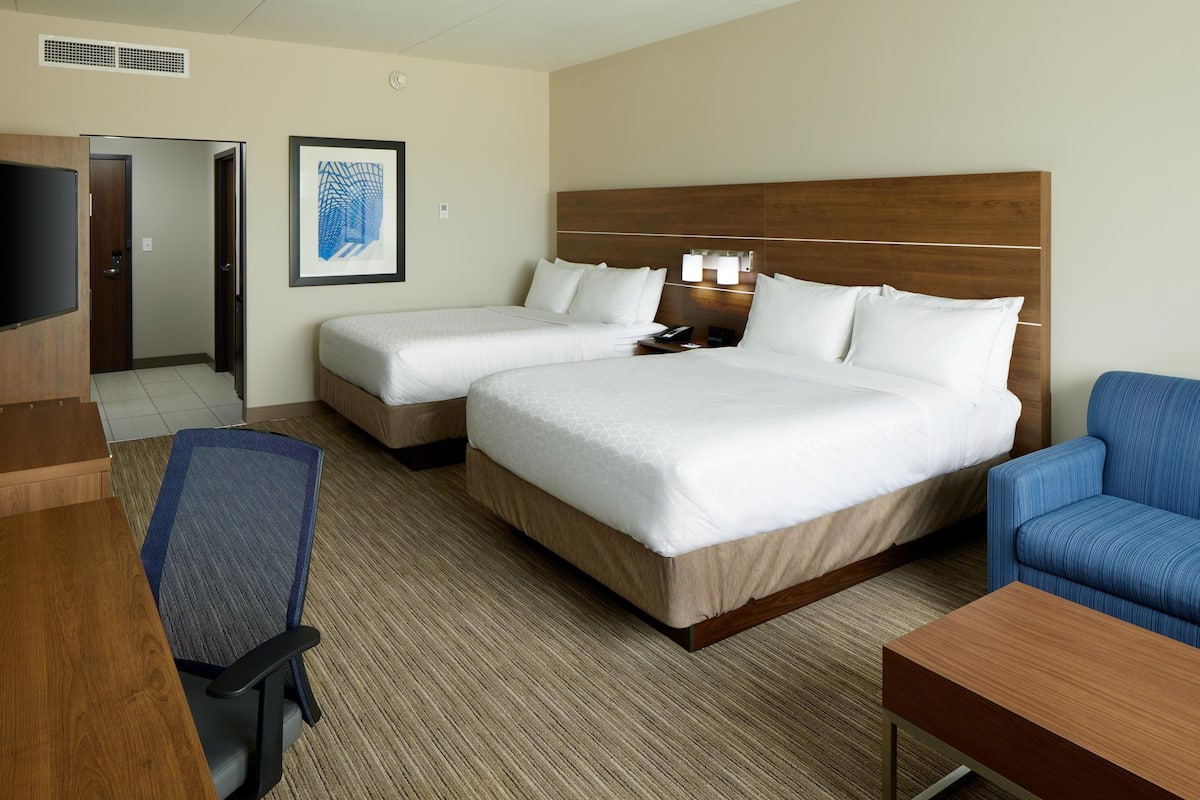 Hypo-allergenic bedding available, down comforters, in-room safe, desk