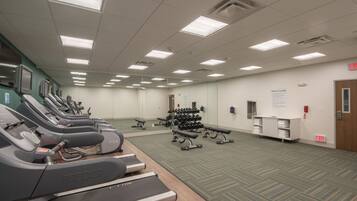 Stay active with our fitness center, featuring treadmills and free weights.